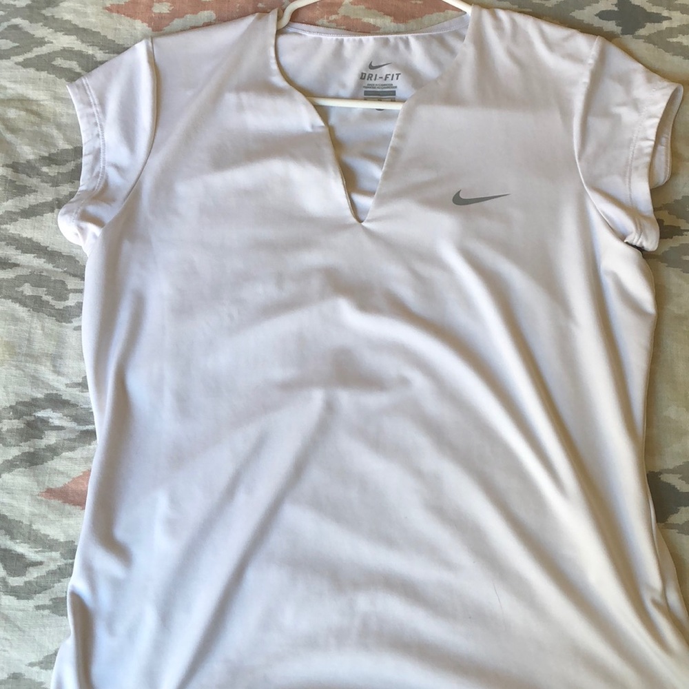 Short sleeved workout/golf shirt.